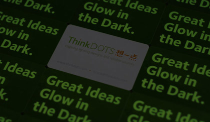 ThinkDots business card in the dark